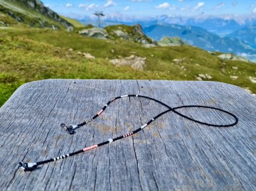 Zonnebrilkoordje - zwart roze koord 2006033 1